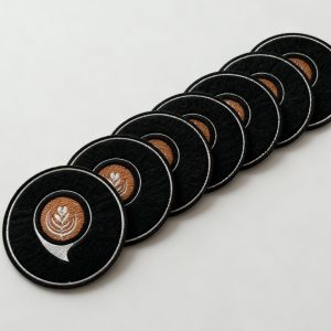 dreamina 2026 01 19 2822 Use the black coaster with the latte art